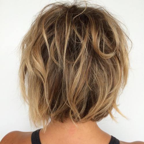 brown messy bob with blonde and caramel highlights