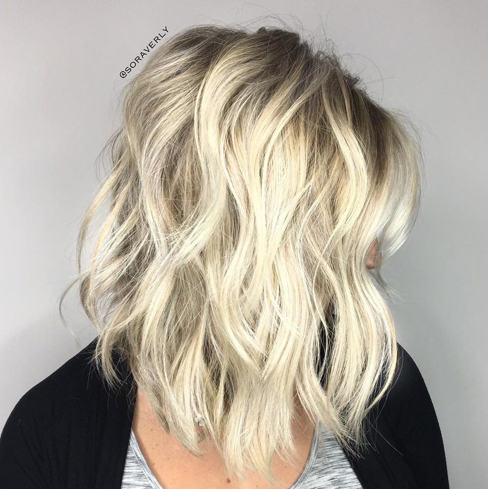 Radiant Blonde Lob with Tousled Waves