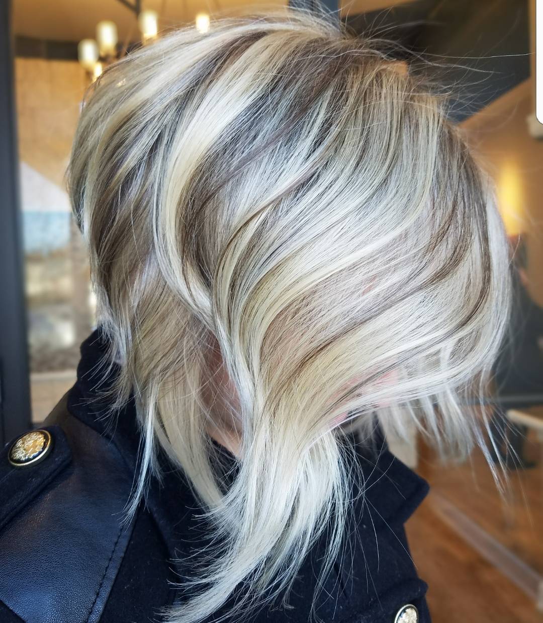 Steeply Angled Blonde Bob with Lowlights